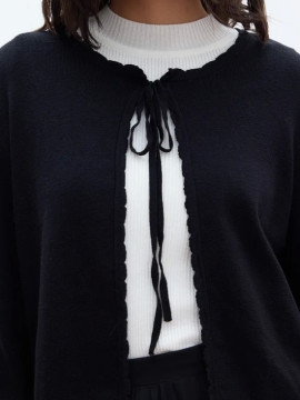 Manuka zacht gebreid vest met vetersluiting