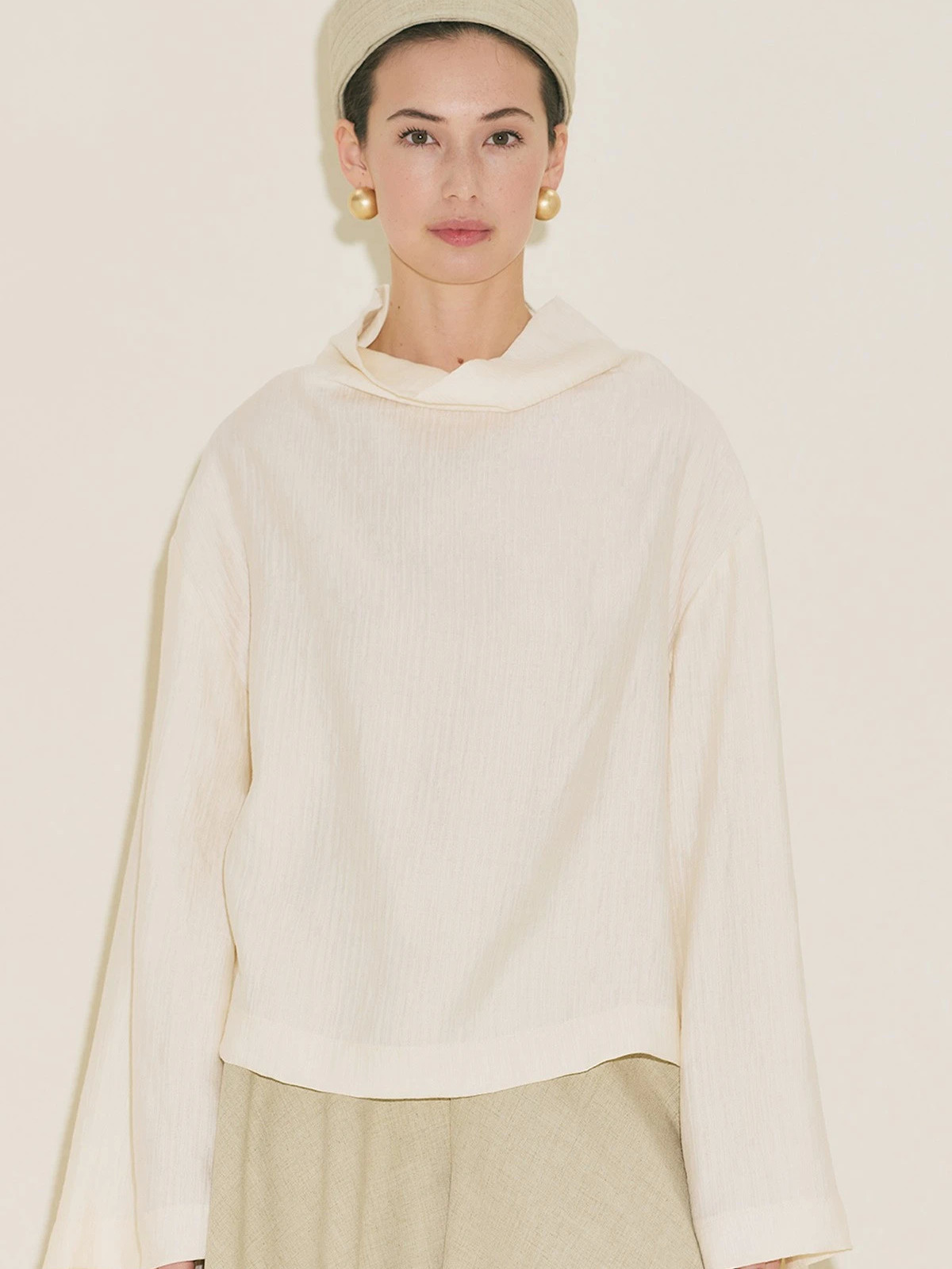 Manuka Gestructureerde capeblouse