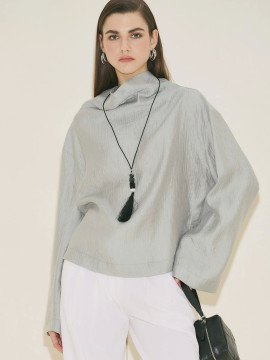 Manuka Gestructureerde capeblouse