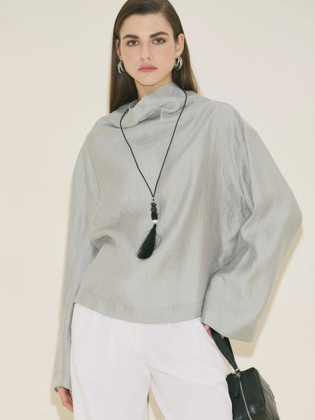 Manuka Gestructureerde capeblouse